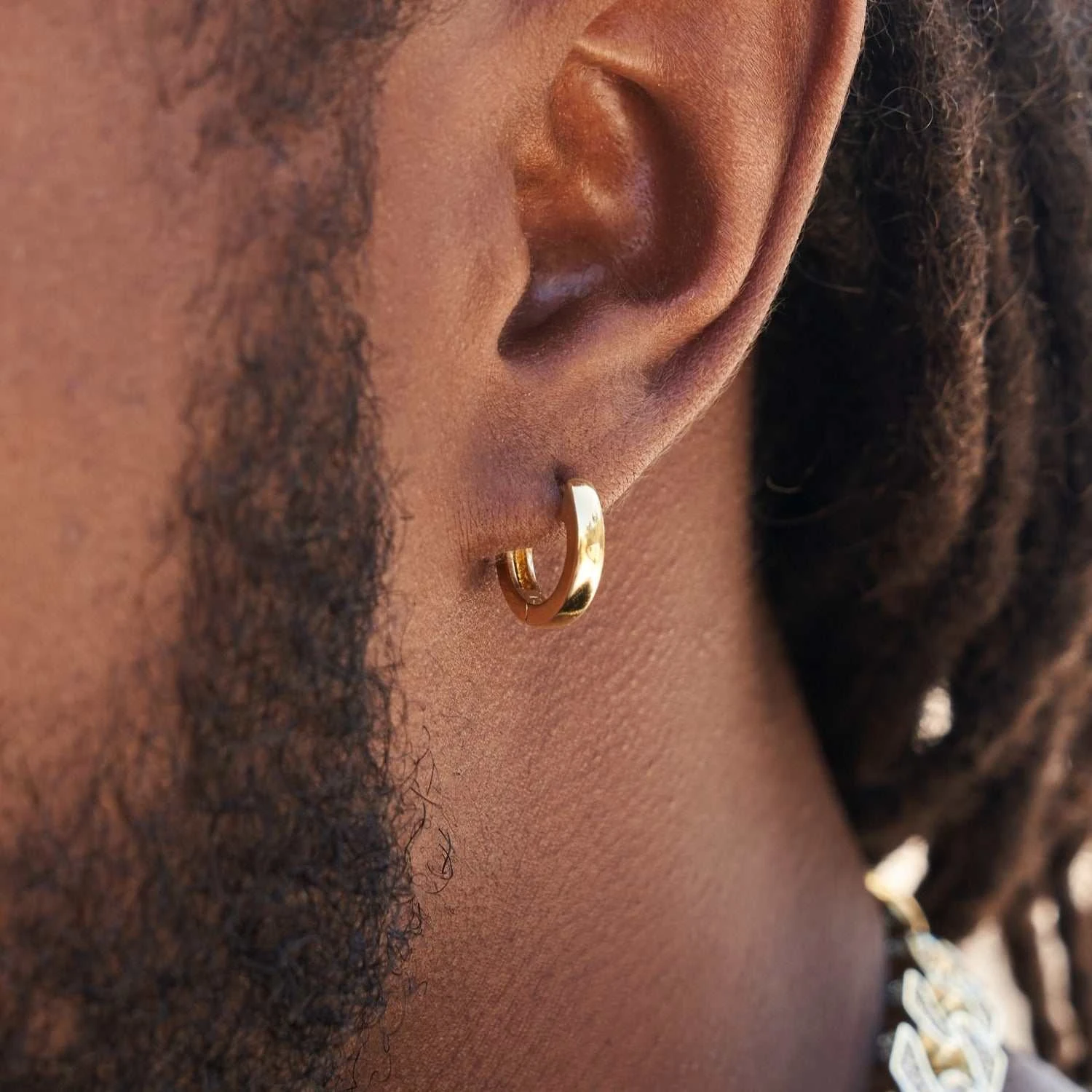 Polished Round Huggie Earrings In Yellow Gold - Image 2