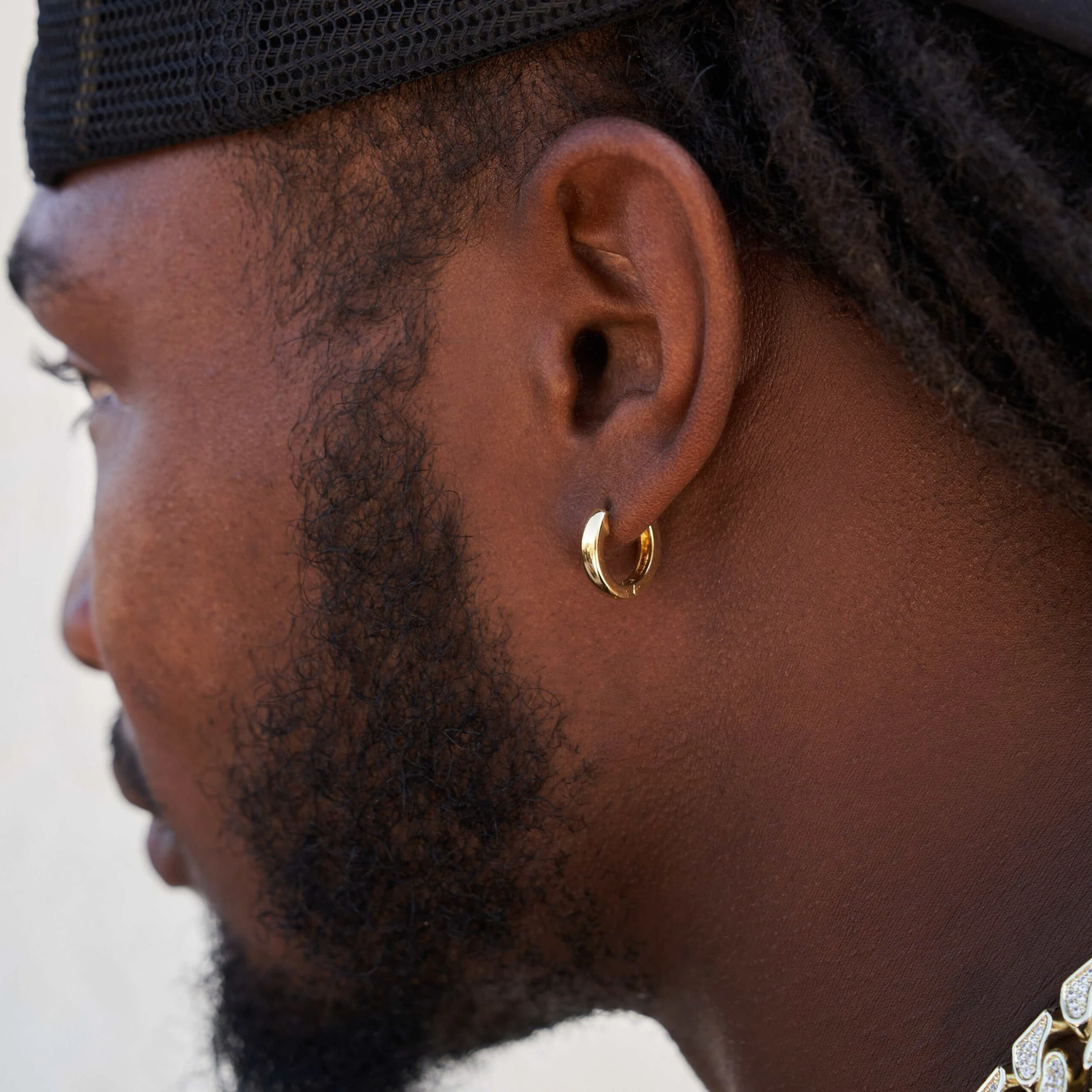 Polished Round Huggie Earrings In Yellow Gold - Image 3